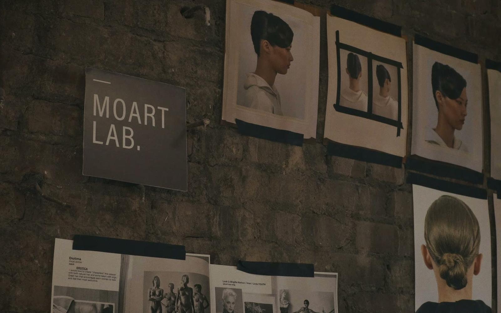 MOART LAB. sign and face chart backstage at NYFW